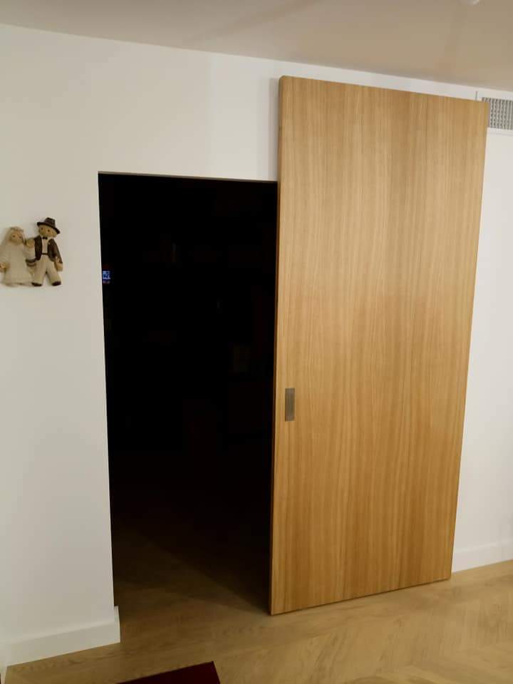 Porte coulissante en bois Saint Romain de Popey